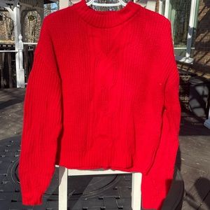 Bright red knit sweater